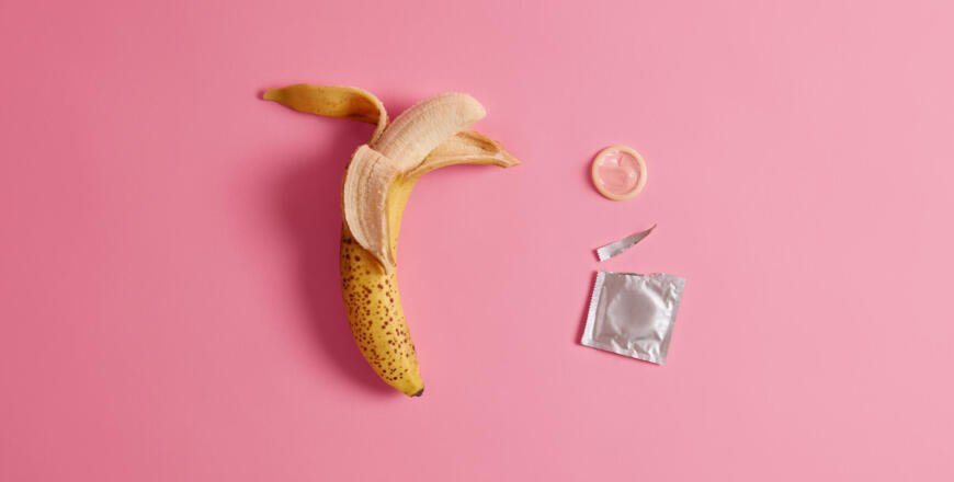 effective-preventing-pregnancy-product-your-safety-open-condon-package-with-banana.jpg
