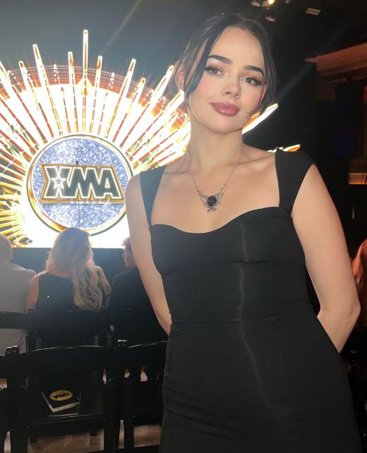 Adult Industry University (AIU) founder attending an industry event. Learn how to succeed in the adult industry, make money on OnlyFans, and grow your brand with expert guidance. AIU offers step-by-step courses, career coaching, and financial strategies for adult content creators.